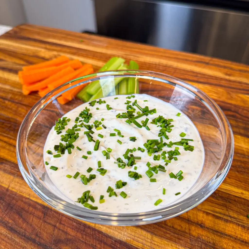 Creamy greek yogurt ranch dip topped with fresh chives